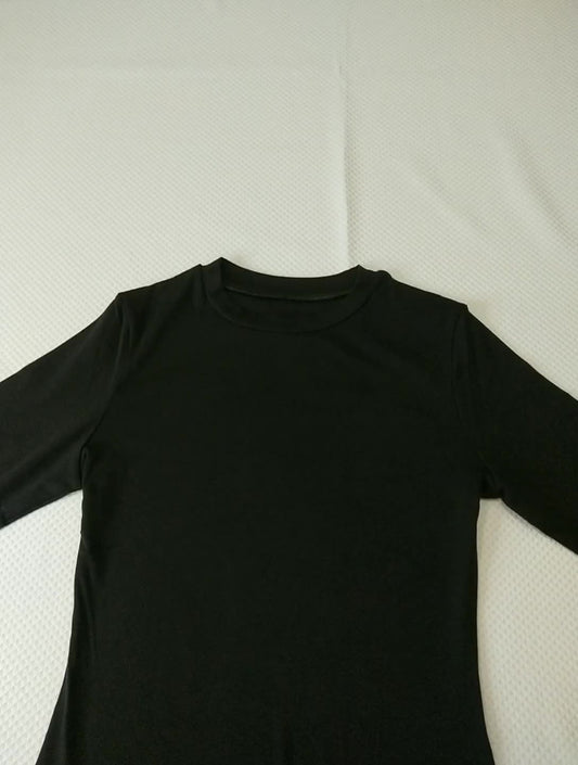 Bodysuit in Black or White with Crew Neck and Long Sleeves - black flat lay front
