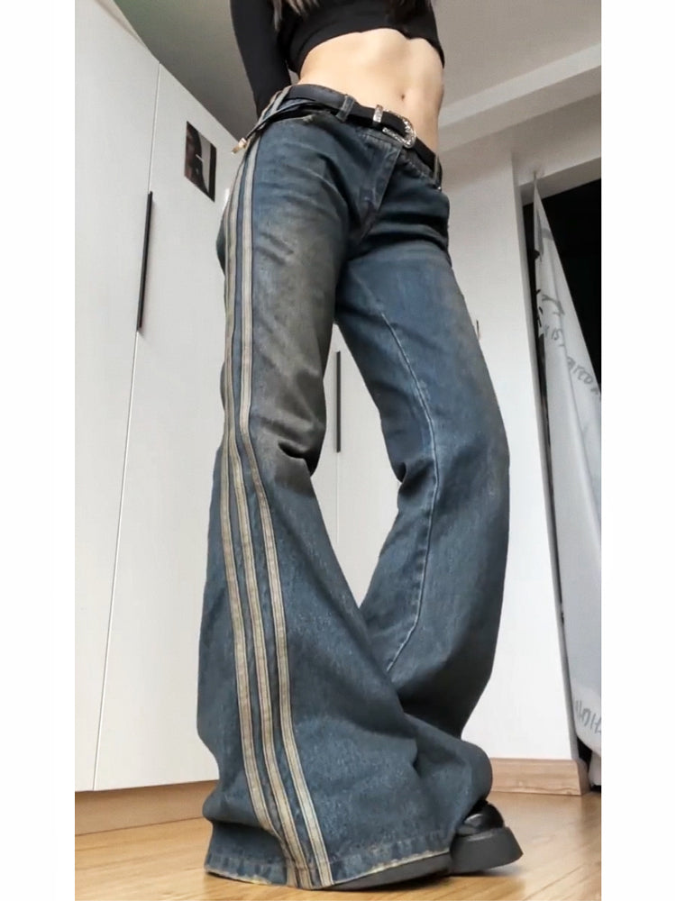 Jeans in Vintage Blue with Side Stripes and Flared Leg - vintage blue angled front view