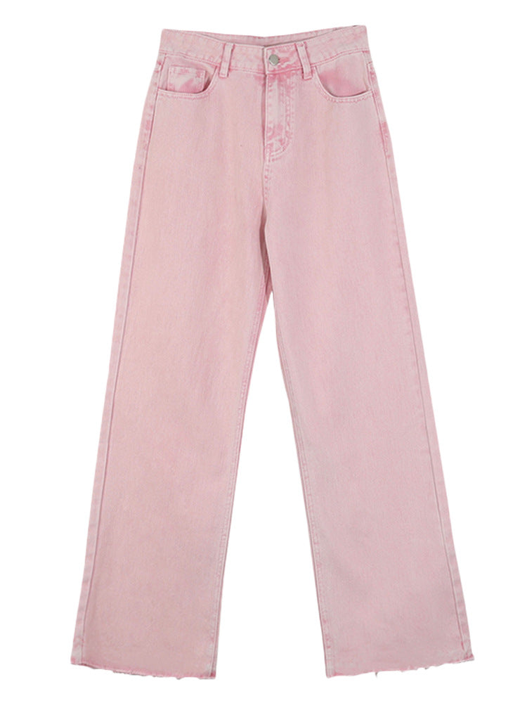 Trousers in Blush Pink High-Rise Wide-Leg Denim - blush pink flat lay front view