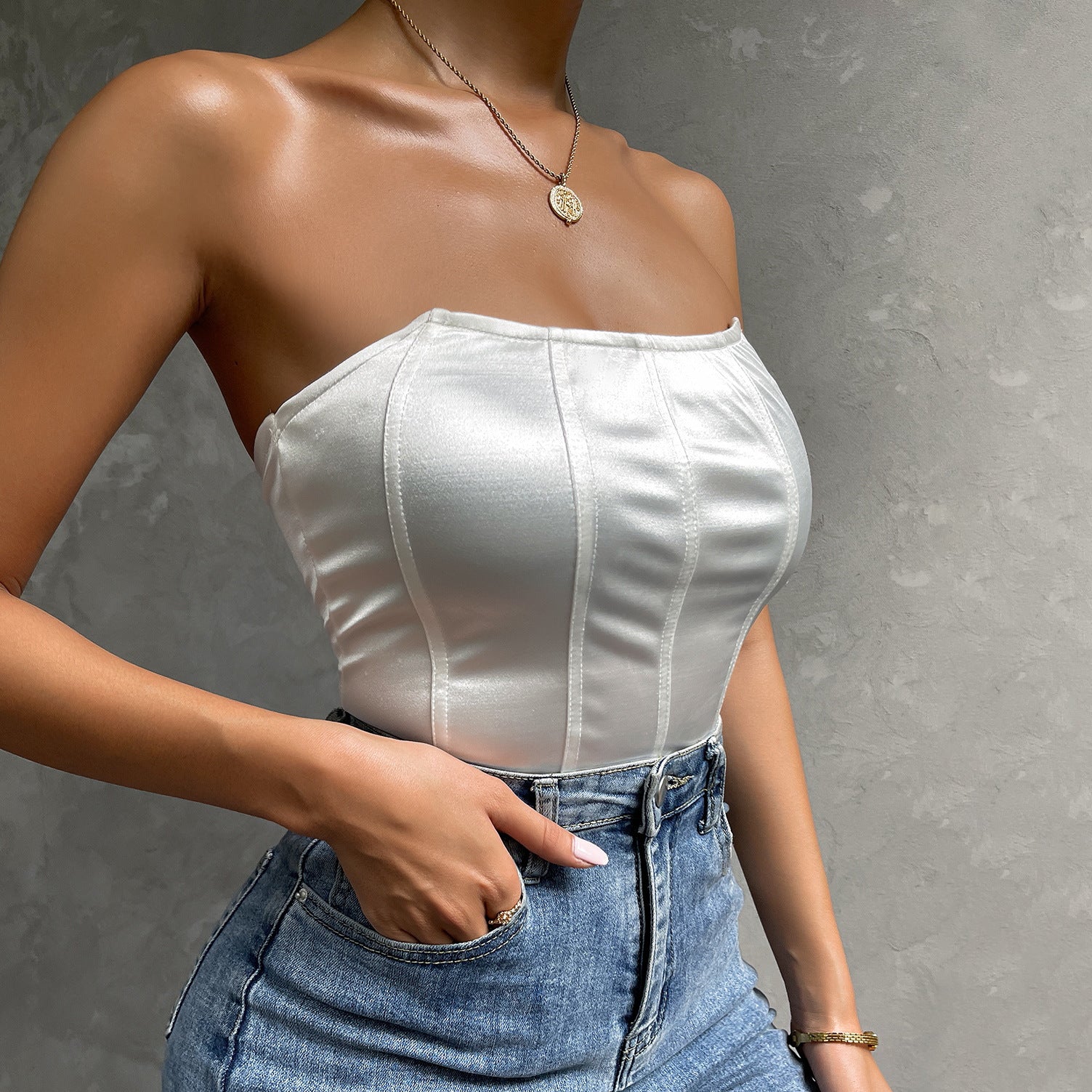 Bodysuit in White Satin-Feel Bandeau Corset Style - white angled front with jeans