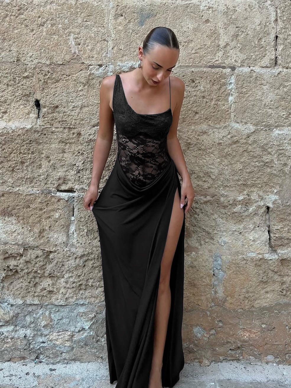 Maxi Dress with Sheer Lace Bodice and Draped Skirt - black front view with thigh split