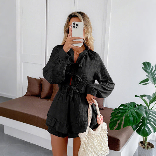 Playsuit in Black with Tie Front and Frill Hem - black front view