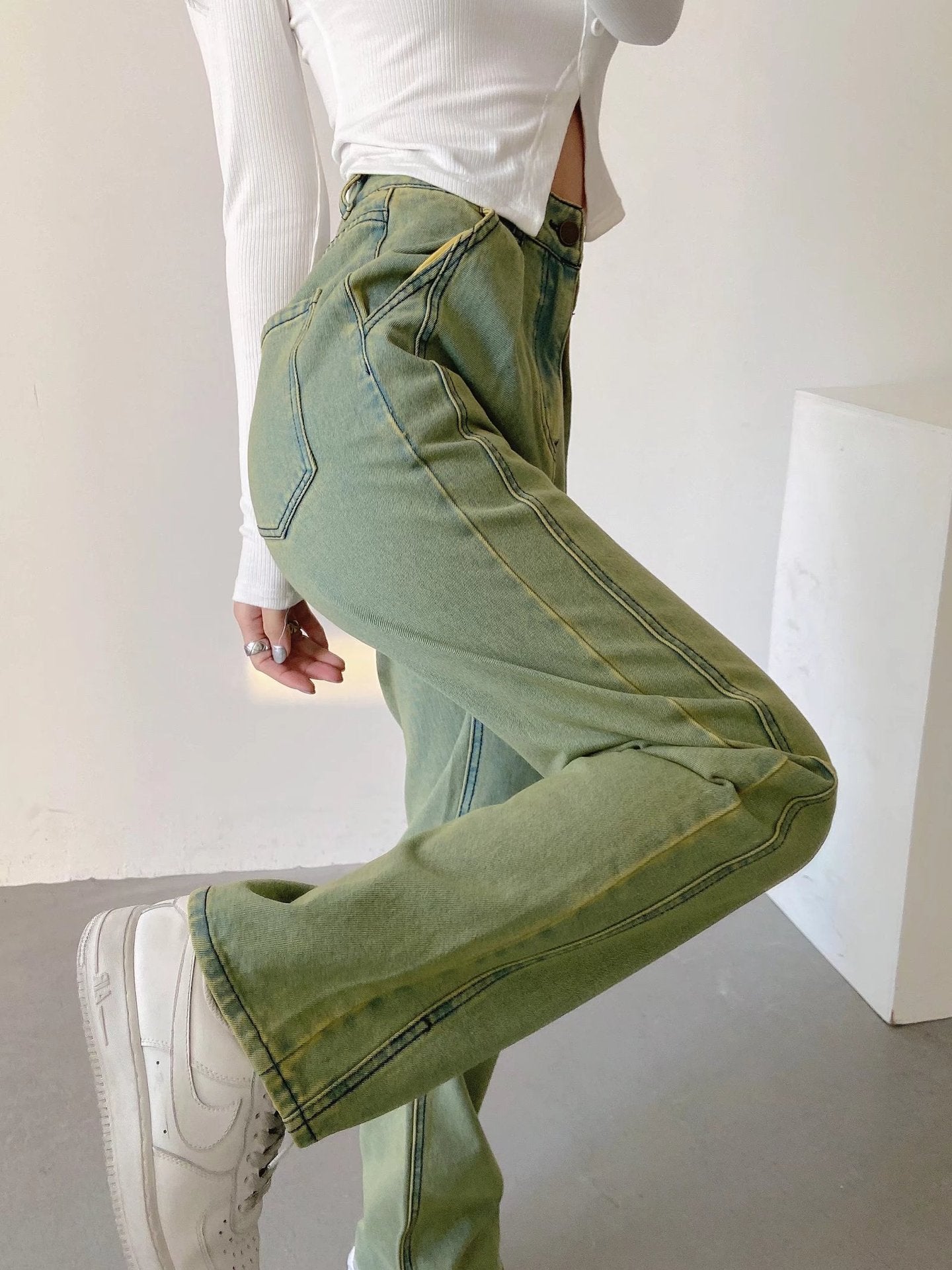 High-Waist Straight-Leg Jeans in Sage Green - sage green side close-up with contrast stitching
