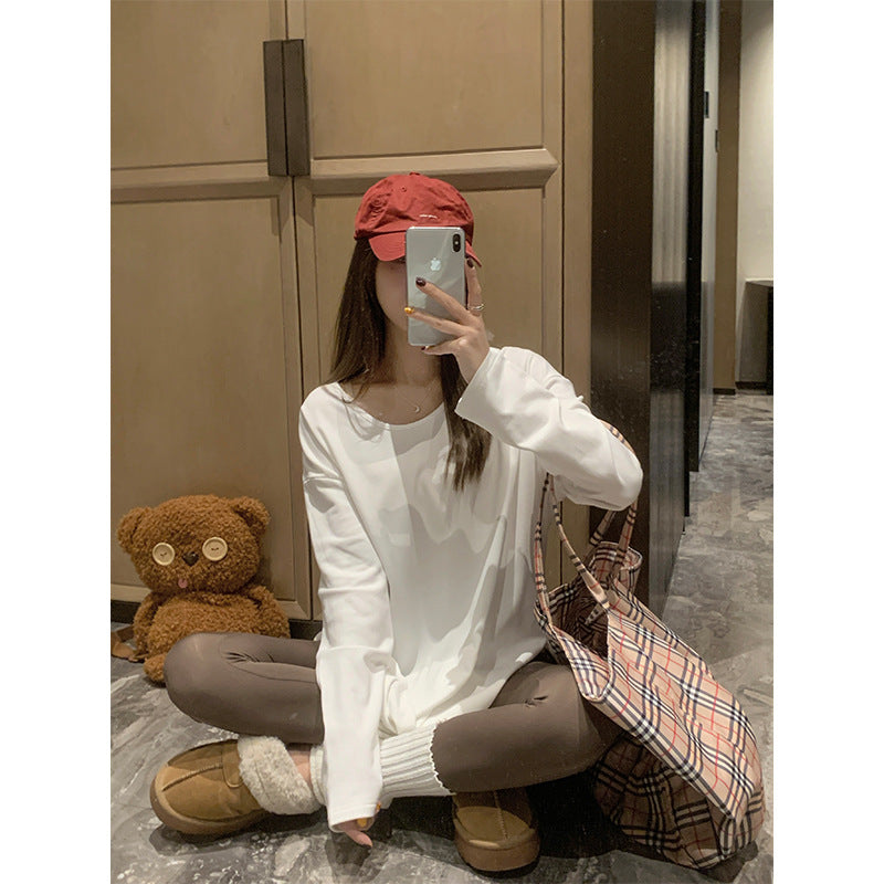 T-Shirt in White with Longline Side-Split Hem - white seated full-length view