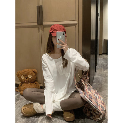 T-Shirt in White with Longline Side-Split Hem - white seated full-length view