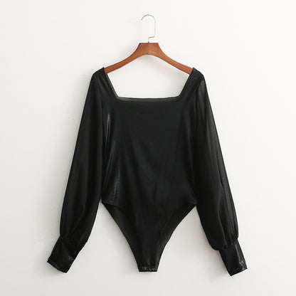 Bodysuit in Black Faux Leather with Sheer Sleeves - black flat lay front view