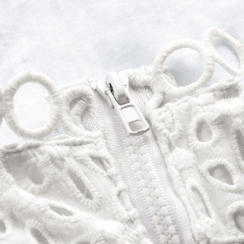 Cami Crop Top in White Broderie Anglaise - white close-up of the zip fastening and eyelet embroidery