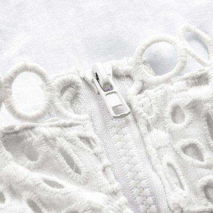 Cami Crop Top in White Broderie Anglaise - white close-up of the zip fastening and eyelet embroidery