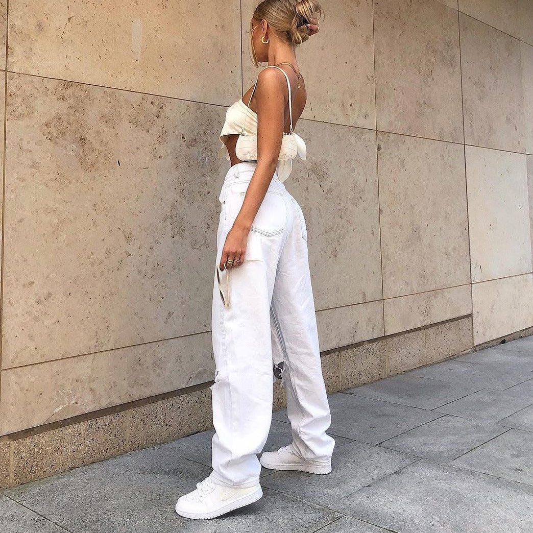 Jeans in White Distressed Baggy Denim - side profile full length styling