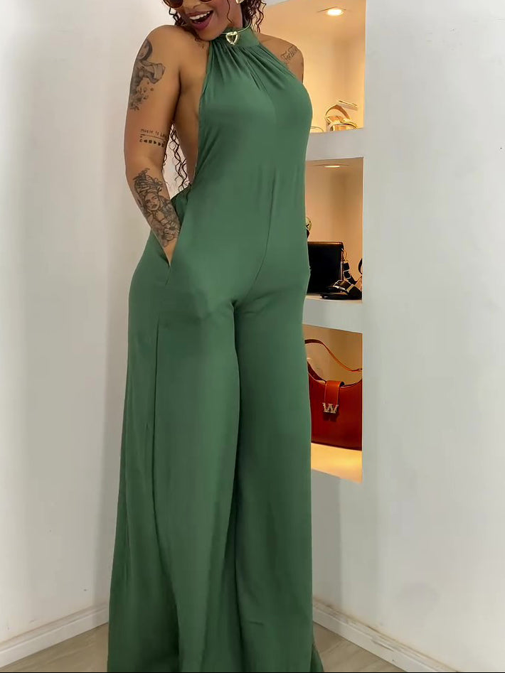 Halter-Neck Backless Wide-Leg Jumpsuit in Green - side view with pockets