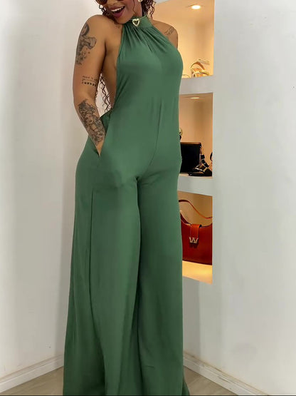 Halter-Neck Backless Wide-Leg Jumpsuit in Green - side view with pockets