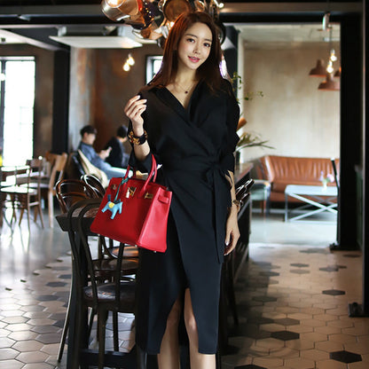 Wrap Midi Dress in Black with Tie Waist - black full-length cafe pose showing front split