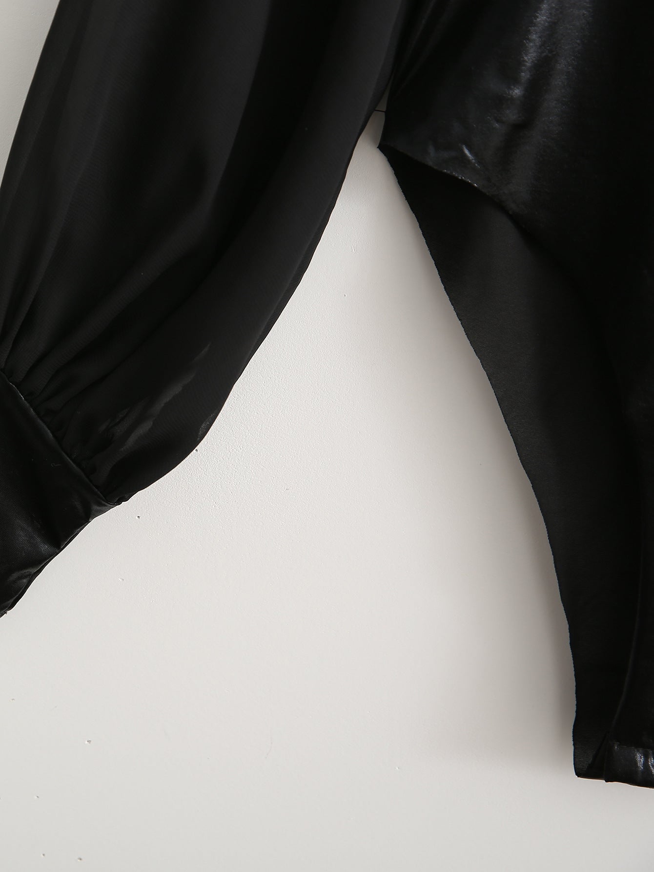 Bodysuit in Black Faux Leather with Sheer Sleeves - black sleeve cuff and bodysuit detail