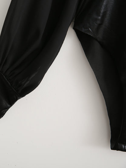 Bodysuit in Black Faux Leather with Sheer Sleeves - black sleeve cuff and bodysuit detail