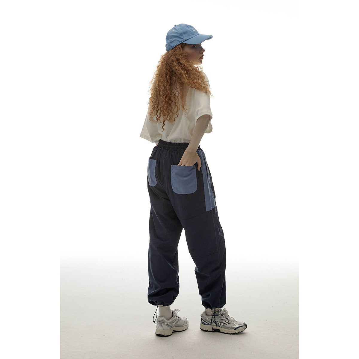 Navy Contrast-Pocket Ankle-Tie Sports Trousers - back view with contrast pockets