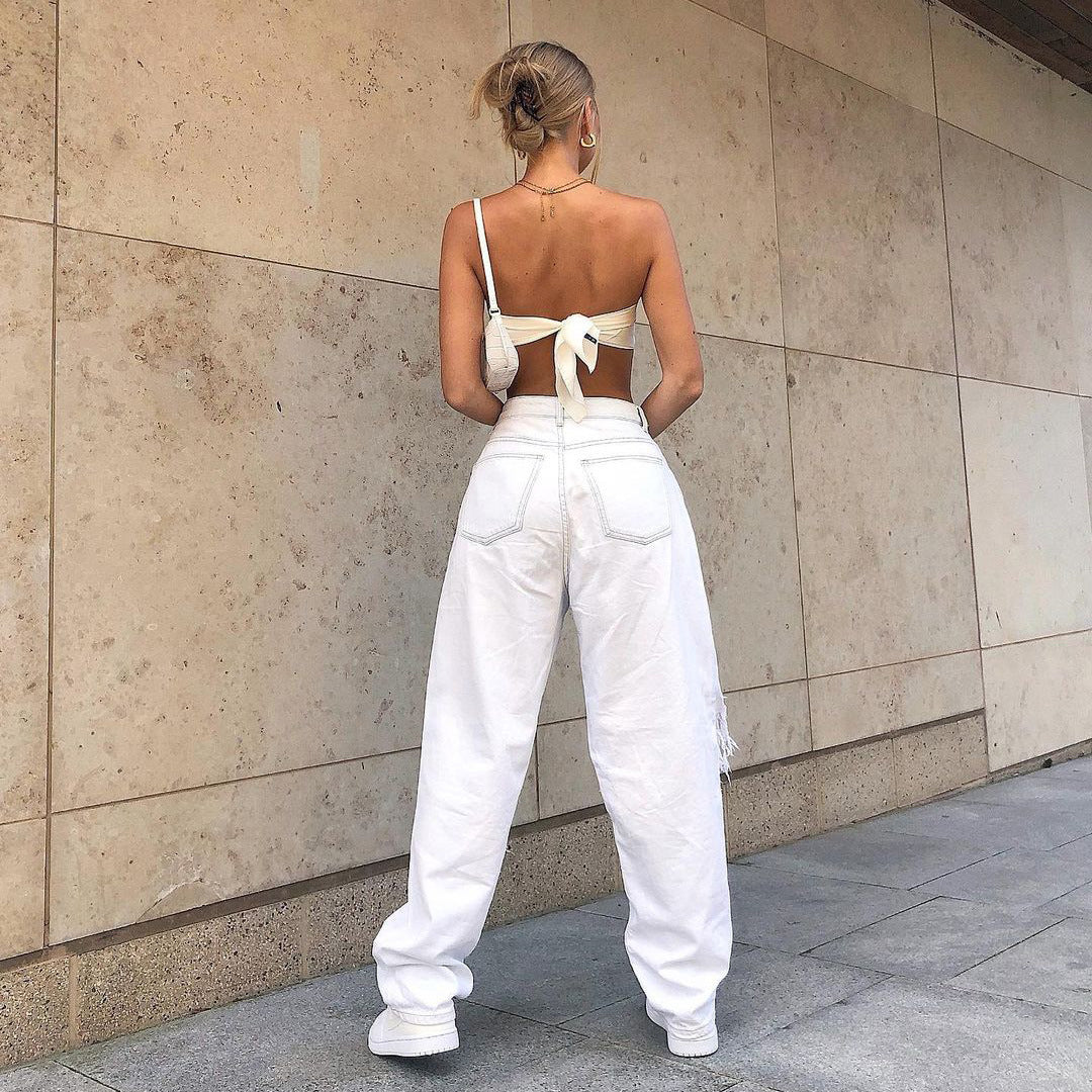 Jeans in White Distressed Baggy Denim - back view mid waist fit