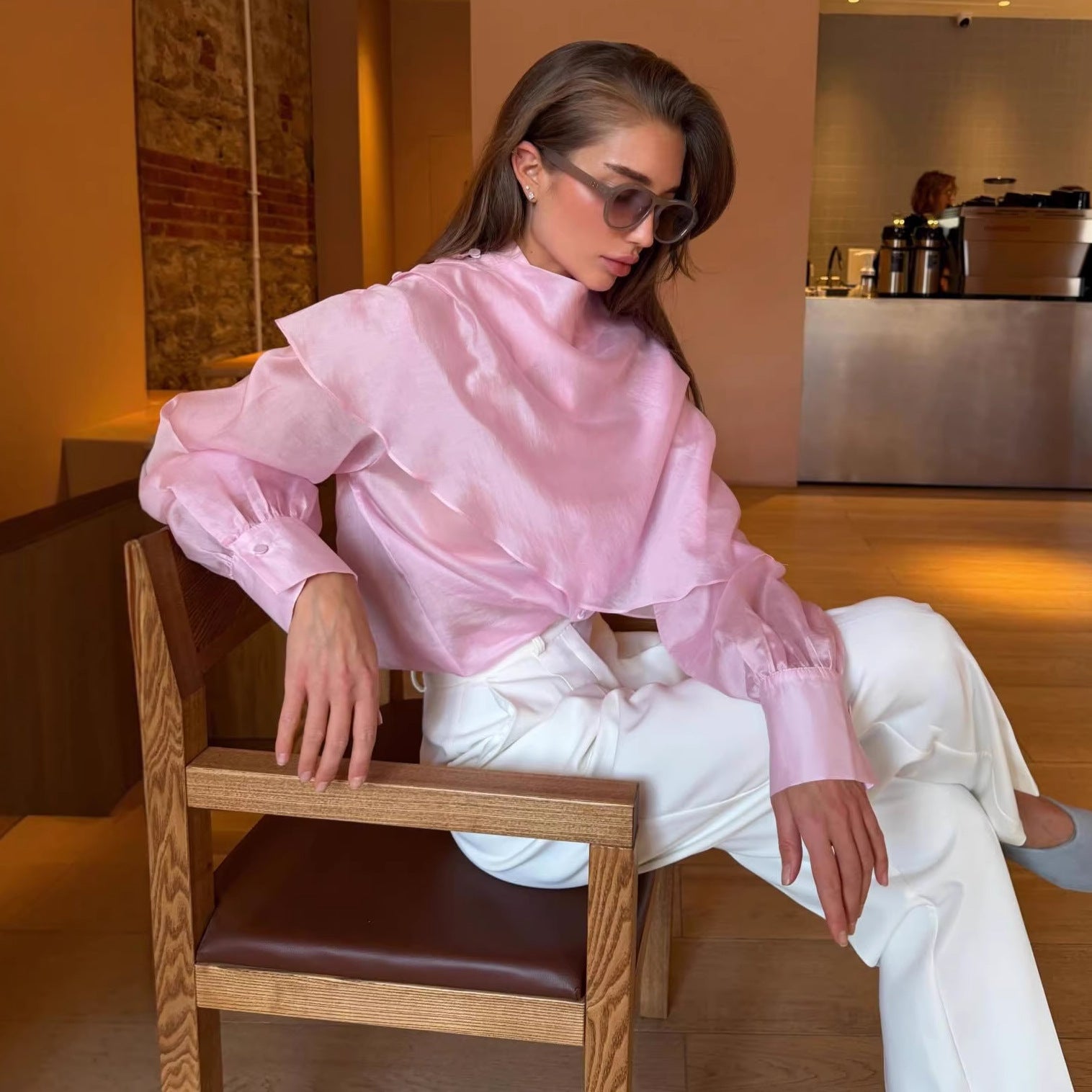 Pink Sheer Long-Sleeve Blouse — seated lifestyle shot