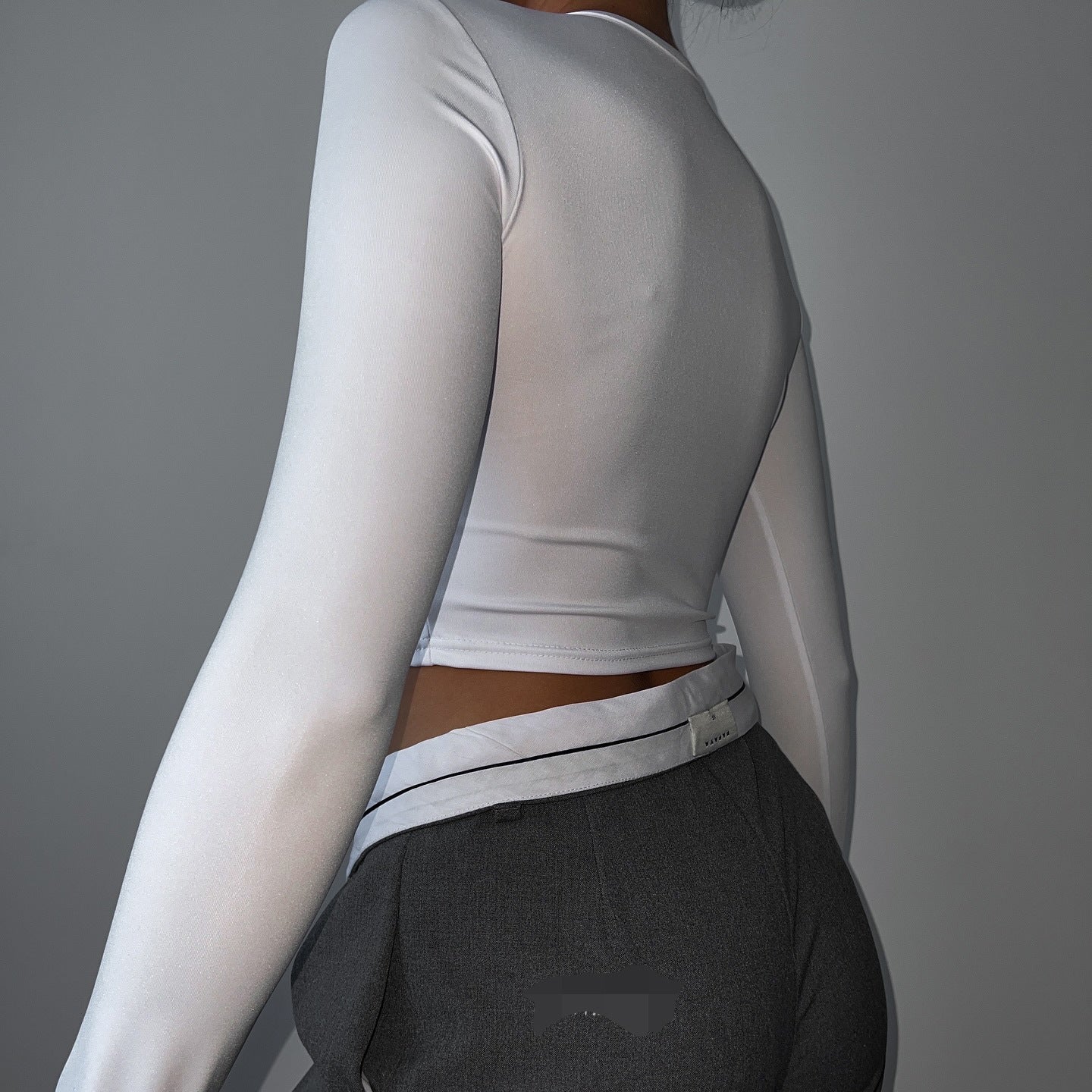 Crop Top in White & Black with Twist Front and Long Sleeves - white back view