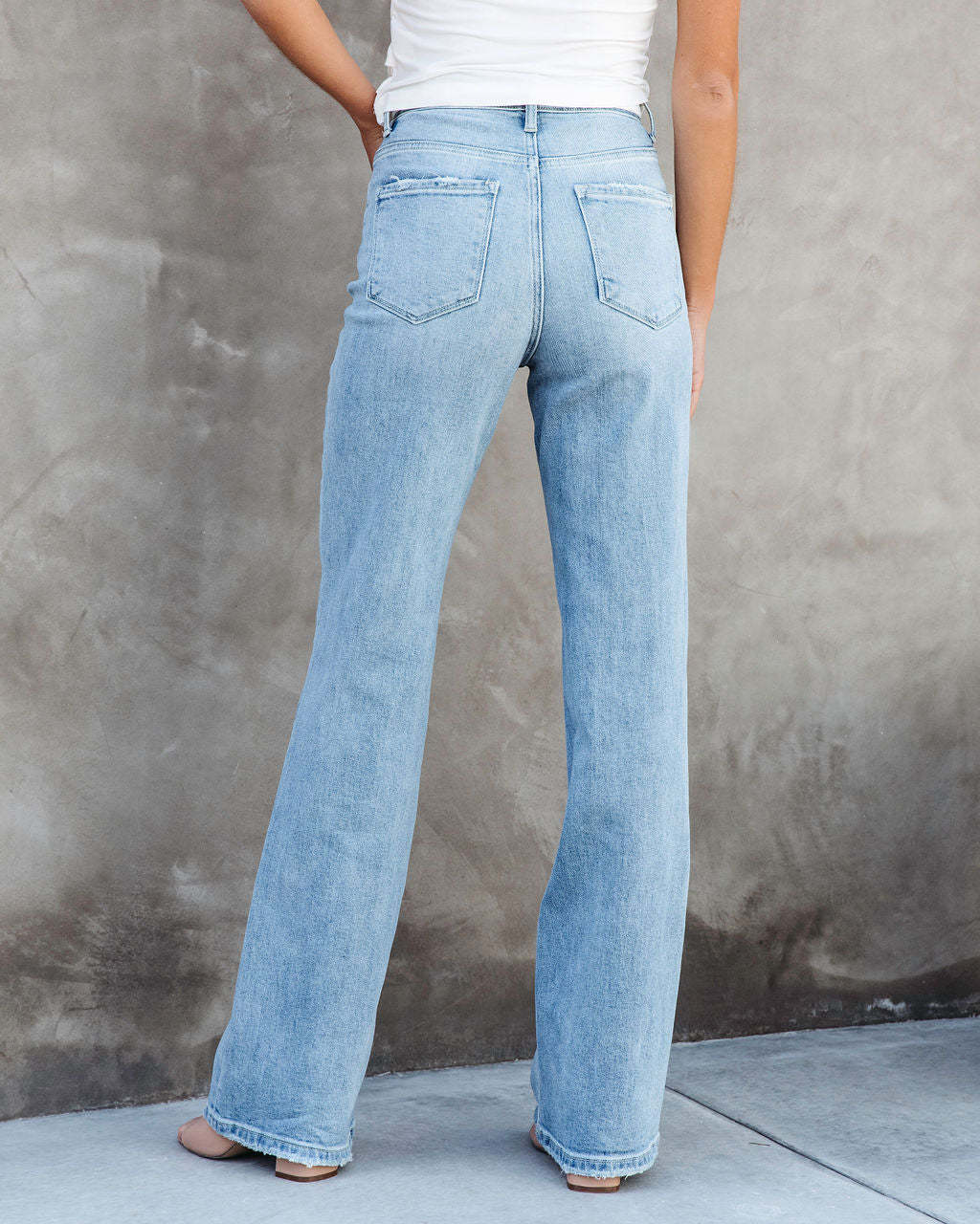 Straight-Leg Jeans in Light Wash Denim - rear pocket and leg view