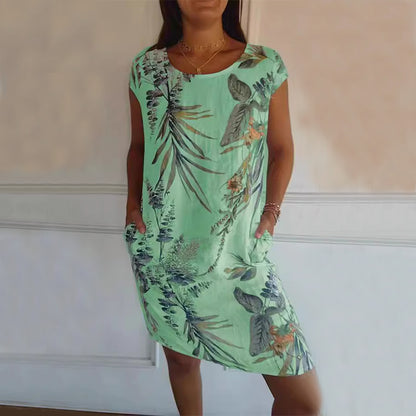 Midi Dress in Tropical Leaf Print with Pockets - mint green front view