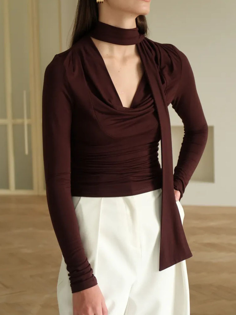Long-Sleeve Top with Scarf Neck and Drape Front - brown front view with white skirt