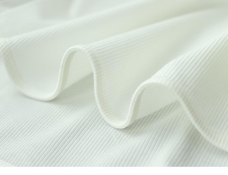 T-Shirt with Extended Cuffs for Layering - white fabric texture close-up