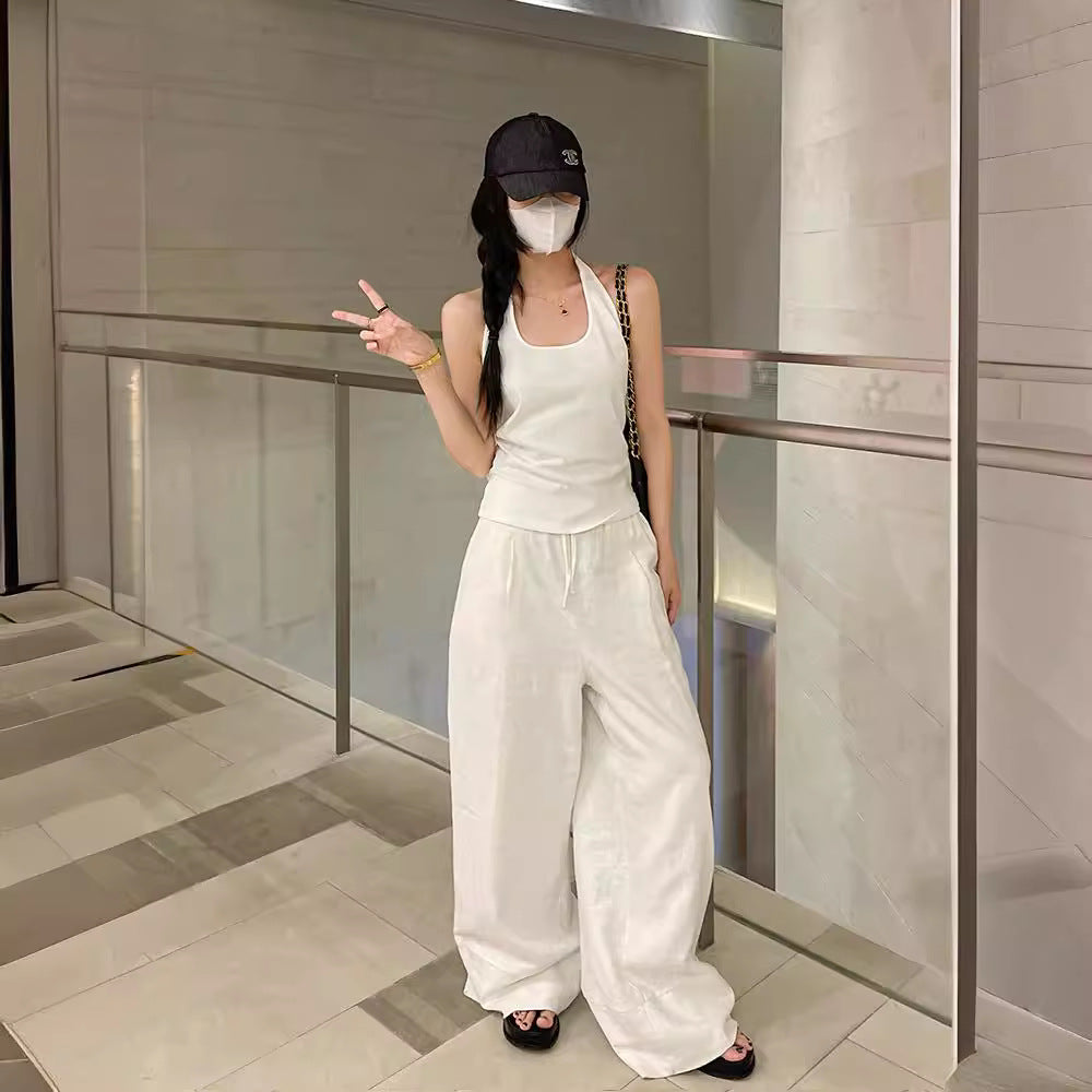 Wide-Leg Trousers in White Linen Blend - white full-length indoor view