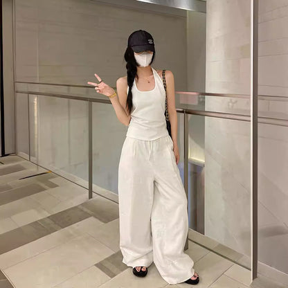 Wide-Leg Trousers in White Linen Blend - white full-length indoor view