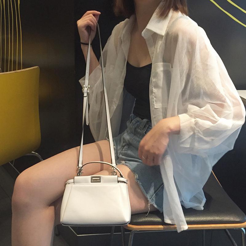 Overshirt in White Sheer Chiffon - white angled lifestyle view