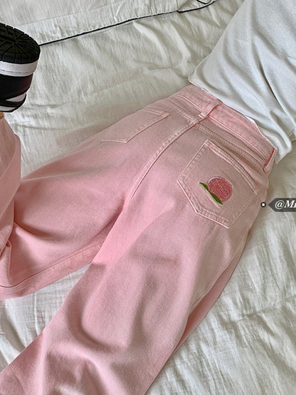 Trousers in Blush Pink High-Rise Wide-Leg Denim - blush pink back pocket detail