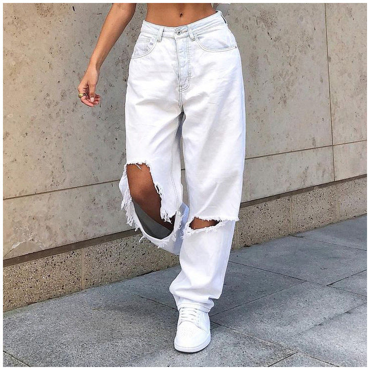 Jeans in White Distressed Baggy Denim - close front fit and ripped knees