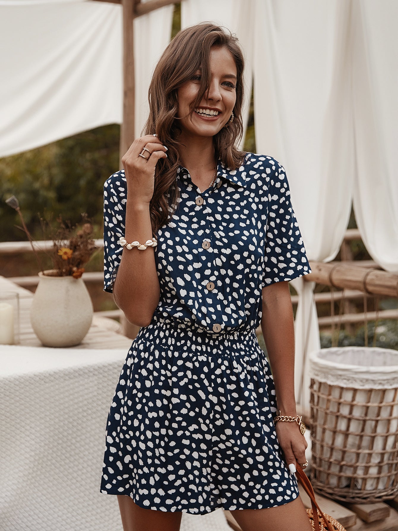 Playsuit with Shirt Collar in Ditsy Floral Print - navy blue smiling front view