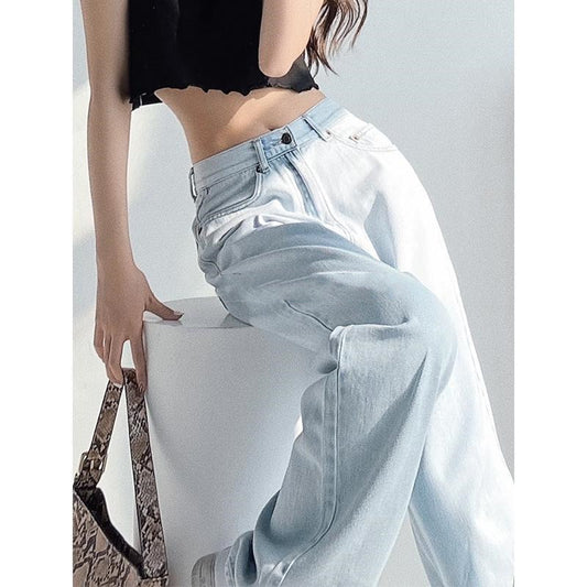 Jeans in Light Blue High-Waist Wide-Leg Denim - seated side drape detail