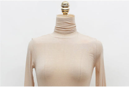 Top in Sheer Stretch Mesh with Turtleneck and Long Sleeves - apricot turtleneck close-up
