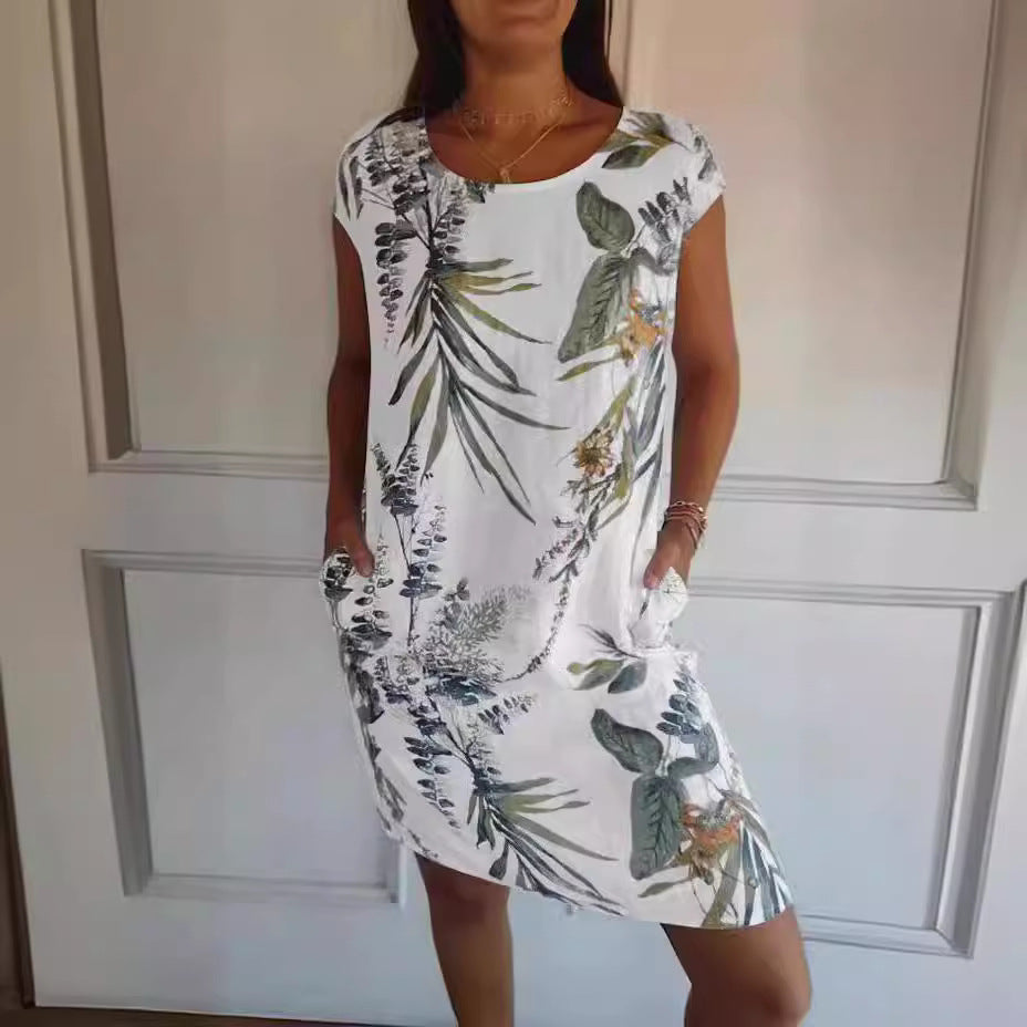 Midi Dress in Tropical Leaf Print with Pockets - white and olive print front view