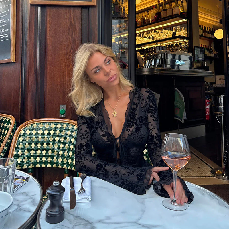 Blouse in Black Sheer Flocked Mesh with Tie Front - black close-up showing flocked mesh texture