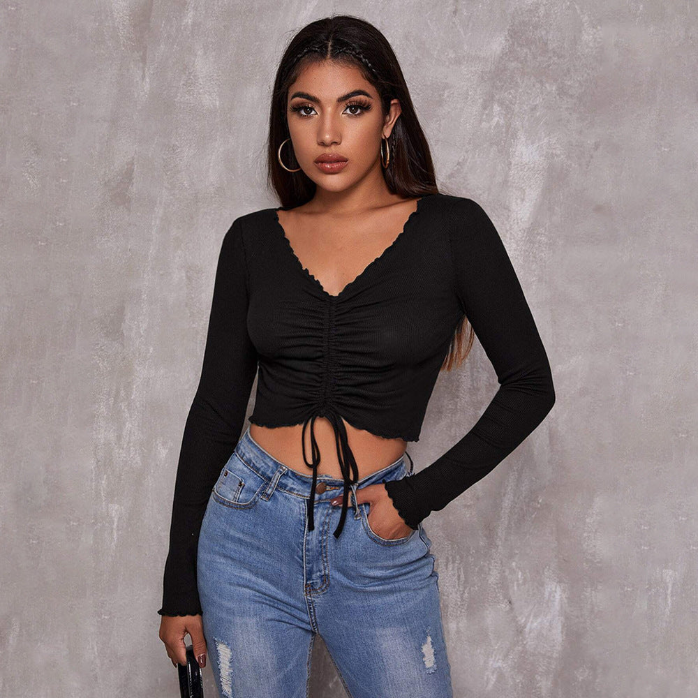 Crop Top in Black with Ruched V-Neck and Long Sleeves - black front close-up