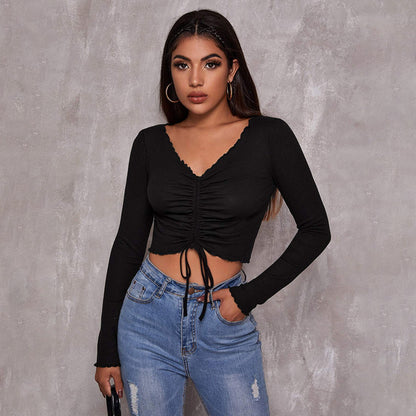 Crop Top in Black with Ruched V-Neck and Long Sleeves - black front close-up