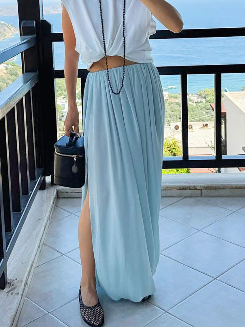 Pleated Wide-Leg Draped Maxi Skirt - light blue, back view outdoor lifestyle shot