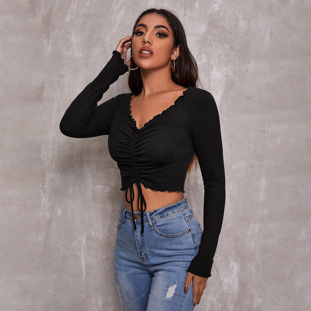 Crop Top in Black with Ruched V-Neck and Long Sleeves - black angled front view