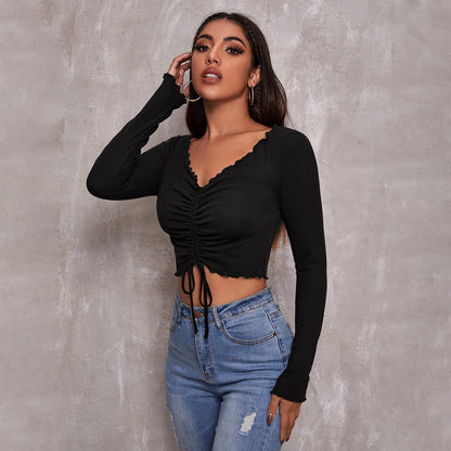 Crop Top in Black with Ruched V-Neck and Long Sleeves - black angled front view