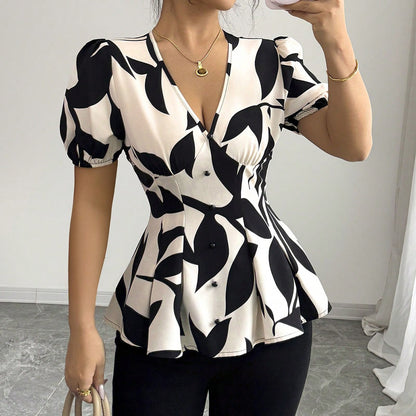 Peplum Blouse in Abstract Print - apricot neckline and waist close-up