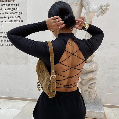 Long-Sleeve Crop Top in Black with Lace-Up Back - back view with criss-cross straps