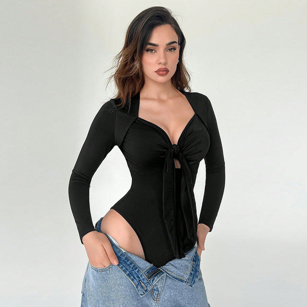 Bodysuit in Black with Ruched Tie Front - black front close-up with low-rise denim styling