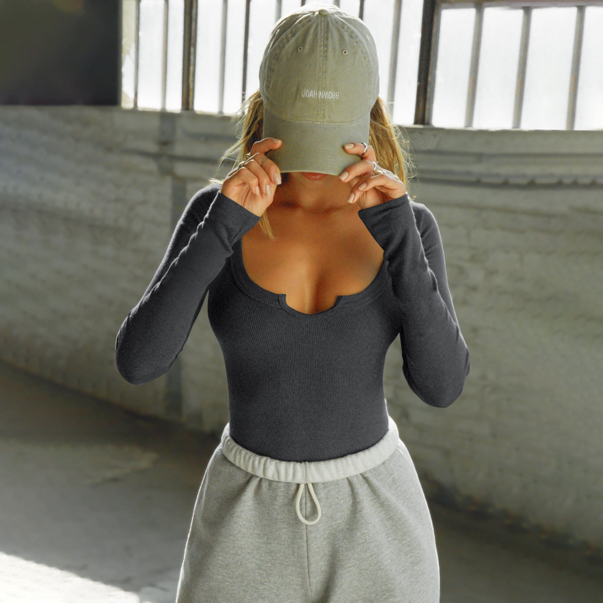 Long-Sleeve Top with Heart Notch Neckline - dark grey front view with cap