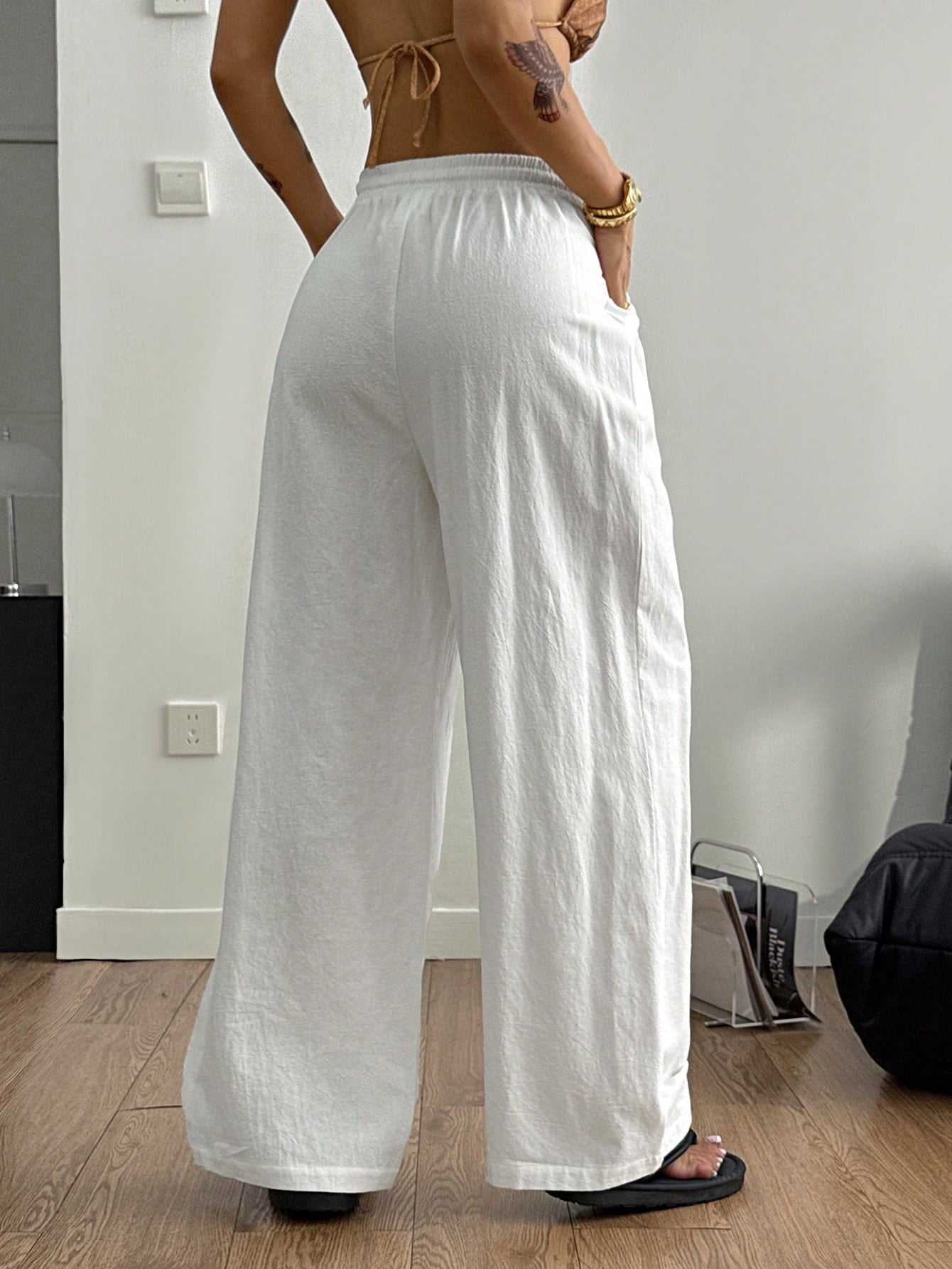 Wide-Leg Trousers in White Crinkle Cotton - white back view