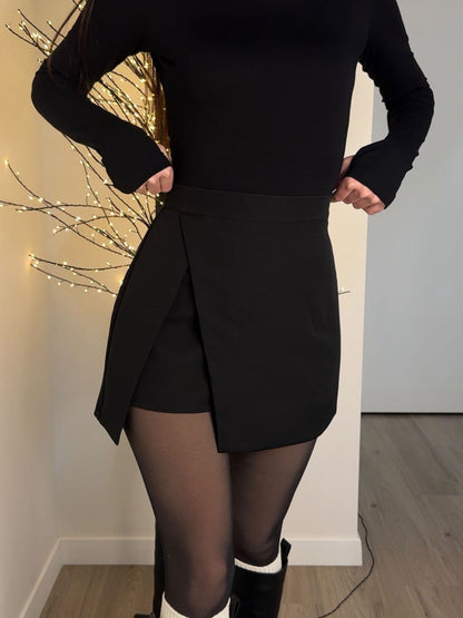 Skorts in Black, High-Waisted Mini - black front view with overlap hem