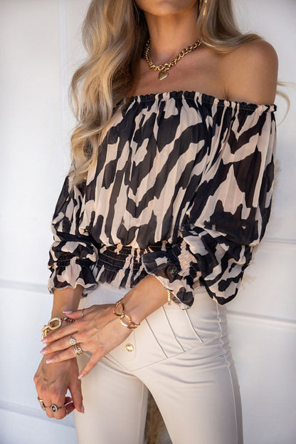 Blouse in Abstract Animal Print with Bardot Neckline - black side close-up