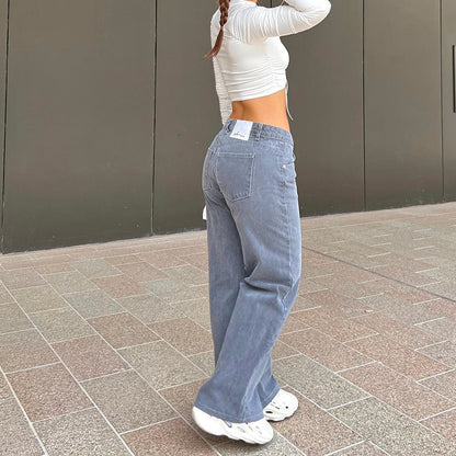 Jeans in Washed Grey Blue Wide-Leg Denim - back waist and wide leg
