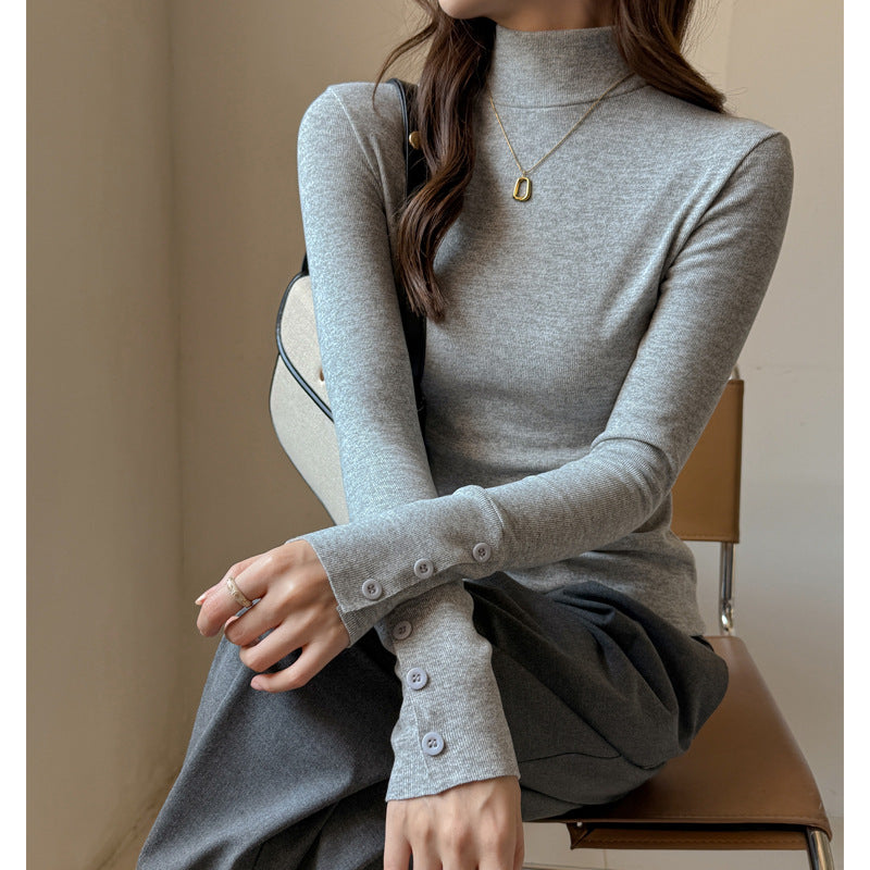Base Layer Top with Mock Neck and Button Cuffs - light gray seated view